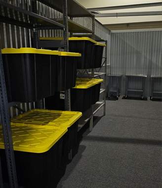 Shelving racks holding sealed evidence bins